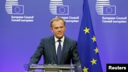 FILE - European Council President Donald Tusk briefs the media in Brussels, Belgium.