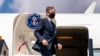 Secretary of State Antony Blinken boards his plane at Jomo Kenyatta International Airport in Nairobi, Kenya, Thursday, Nov. 18, 2021, to travel to Abuja, Nigeria. Blinken is on a five day trip to Kenya, Nigeria, and Senegal.