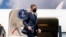 Secretary of State Antony Blinken boards his plane at Jomo Kenyatta International Airport in Nairobi, Kenya, Thursday, Nov. 18, 2021, to travel to Abuja, Nigeria. Blinken is on a five day trip to Kenya, Nigeria, and Senegal.
