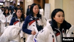 South Korean women's ice hockey team members leave after attending an inaugural ceremony ahead of the 2018 Pyeongchang Winter Olympics, in Seoul, South Korea, Jan. 24, 2018.