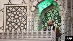 Syria's interim prime minister Mohammad al-Bashir addresses a crowd at the capital's landmark Umayyad Mosque on December 13, 2024. (Photo by Sameer Al-Doumy / AFP)
