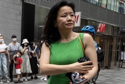 FILE - Cheng Lei, a Chinese-born Australian journalist for CGTN, the English-language channel of China Central Television, attends a public event in Beijing, China, Aug. 12, 2020.