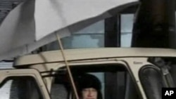 In this video image broadcast on Libyan state television early Tuesday Feb. 22, 2011, Libyan leader Moammar Gadhafi is shown.