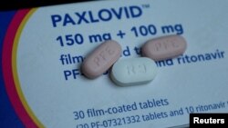FILE - Paxlovid, Pfizer's anti-viral medication to treat COVID-19, is displayed in this picture illustration taken Oct. 7, 2022. 