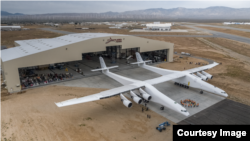 The "Roc" plane is seen outside its hangar. (Stratolaunch)