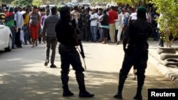Policemen stand guard during a pro-Biafra rally in Abuja, Nigeria, Dec. 1, 2015. Biafra supporters have restarted a drive toward the establishment of a separate Biafra nation.