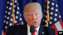 President Donald Trump speaks regarding the on going situation in Charlottesville, Va., at Trump National Golf Club in Bedminster, N.J., Aug. 12, 2017.