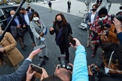 Democratic vice presidential candidate Sen. Kamala Harris, D-Calif. speaks to reporters before a campaign event, Oct. 24, 2020, in Cleveland.