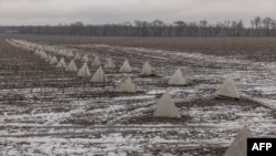 This photograph taken on January 28, 2024, shows the “dragon’s teeth” fortifications that were installed in recent months by the Ukrainian army on the Kupiansk direction, in the Kharkiv region, amid the Russian invasion of Ukraine.