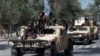 Taliban threaten to use US arms to thwart attempts to retake them 