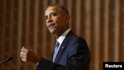 President Barack Obama pauses during remarks on Jewish American History Month at the Adas Israel Congregation synagogue in Washington, May 22, 2015. 