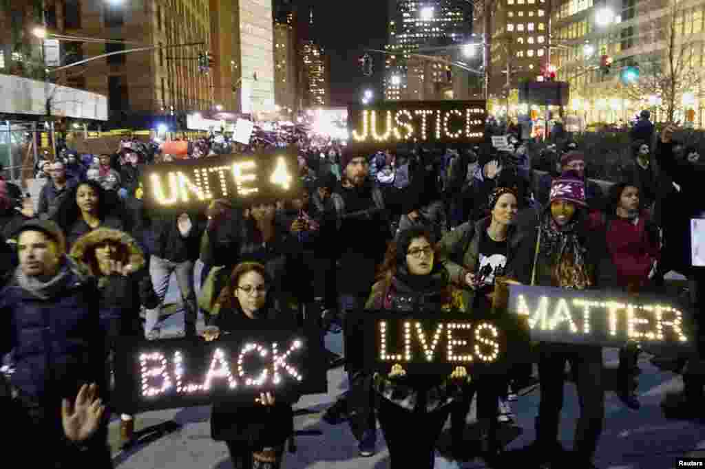 Protesters demonstrate in Lower Manhattan in New York City, demanding justice for the death of Eric Garner, Dec. 4, 2014. 