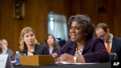 FILE - Assistant Secretary of State for African Affairs Linda Thomas-Greenfield, right, testifies during a Senate Foreign Relations Committee hearing on Capitol Hill in Washington, January 9, 2014.